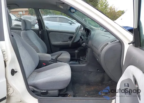 2001 Mitsubishi Mirage Es z USA, uszkodzony, nr VIN JA3AY26C11U038582